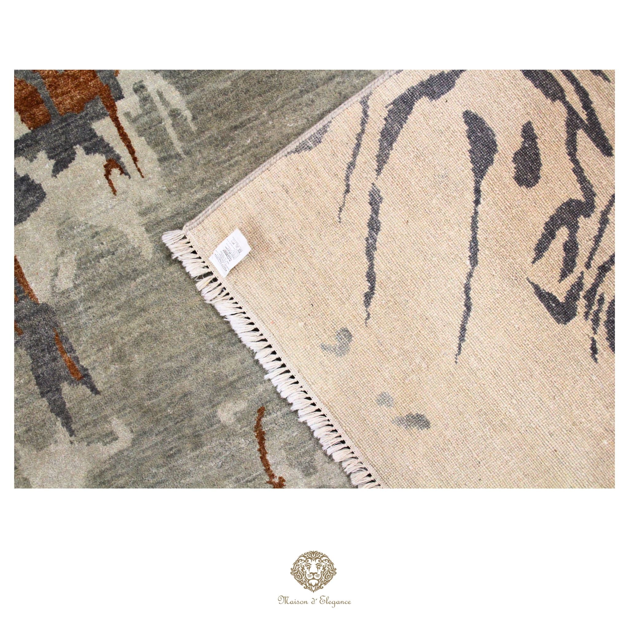 Alfombra moderna de lana exclusiva, hecha a mano, con patrón abstracto en fibras naturales.