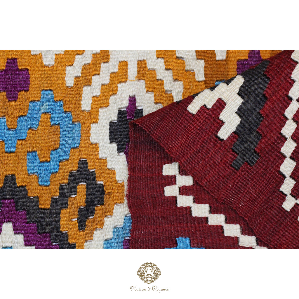 Close-up of a patterned fabric with geometric design on a white background