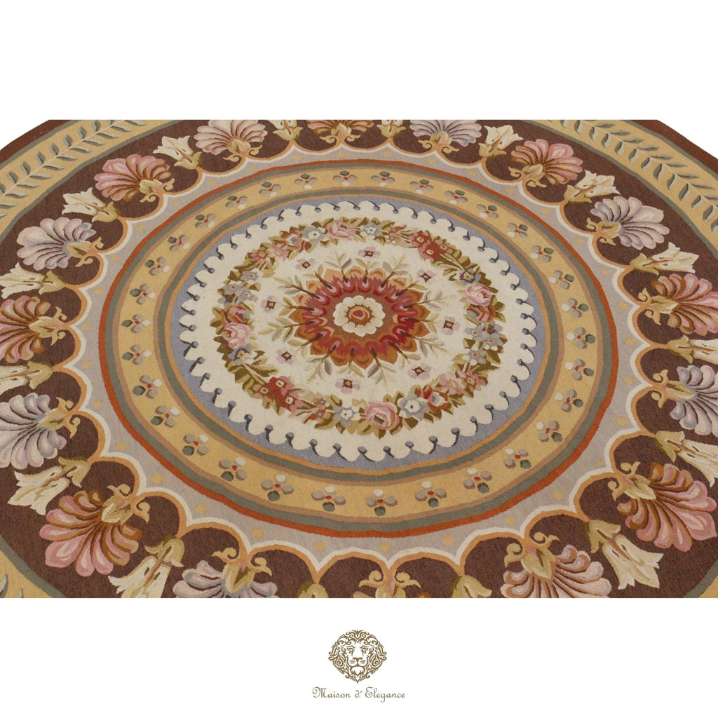 Decorative round French Aubusson with floral patterns on a brown background