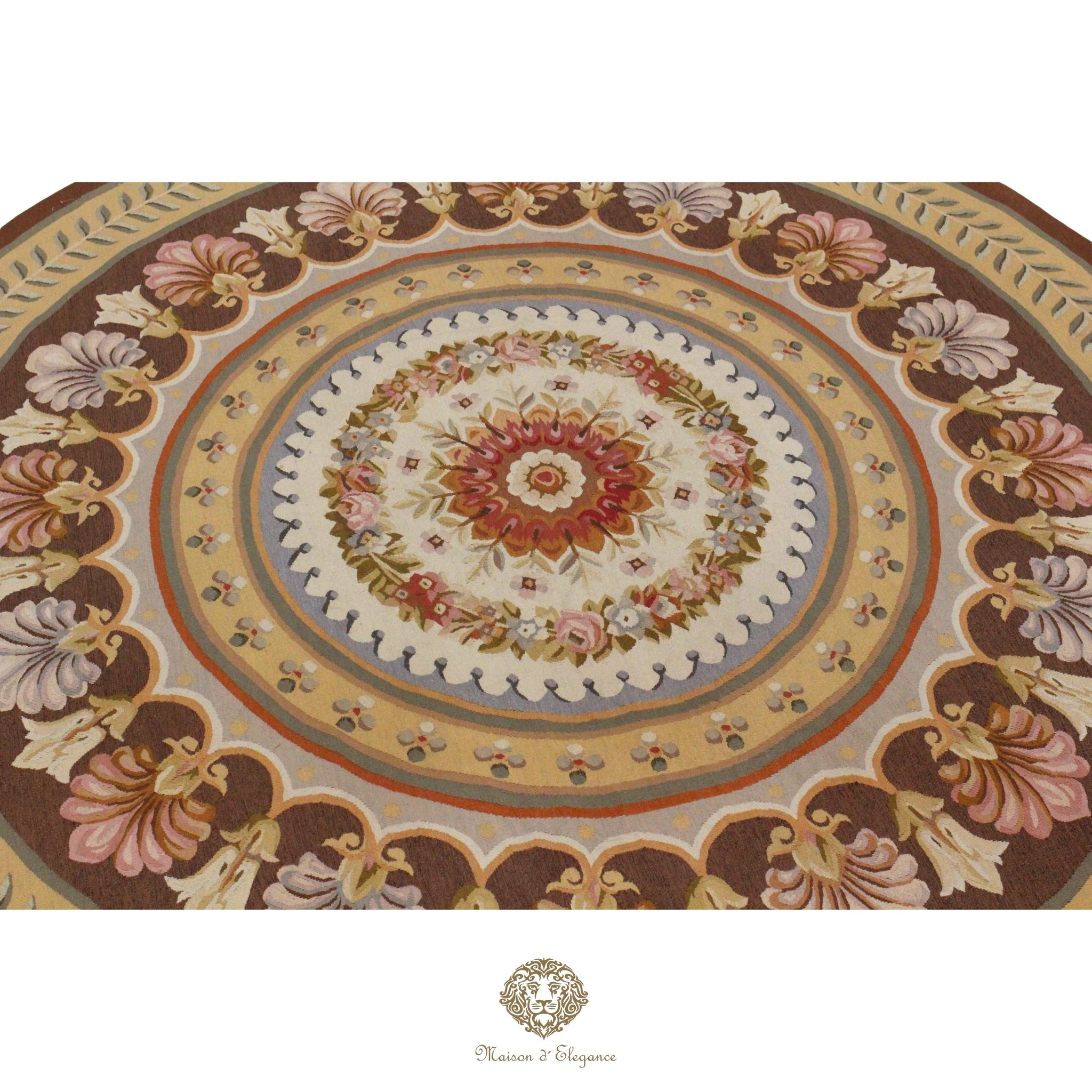 Decorative round French Aubusson with floral patterns on a brown background