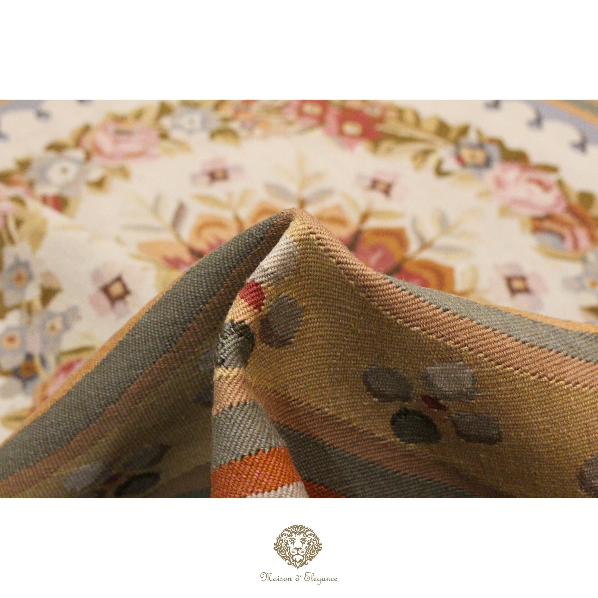 Close-up of a textured French Aubusson with a floral pattern in the background