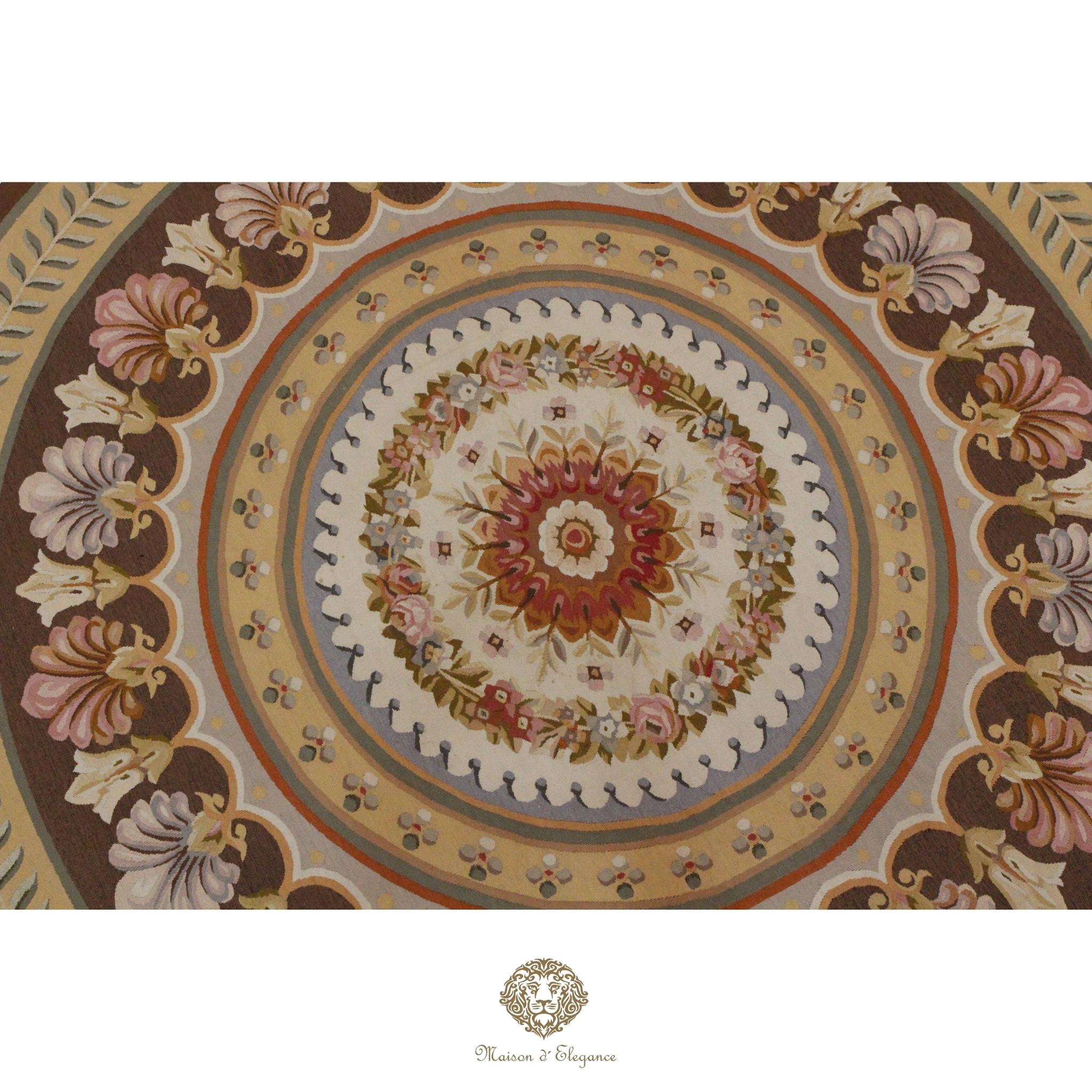 Decorative roundel French Aubusson with floral patterns on a brown background