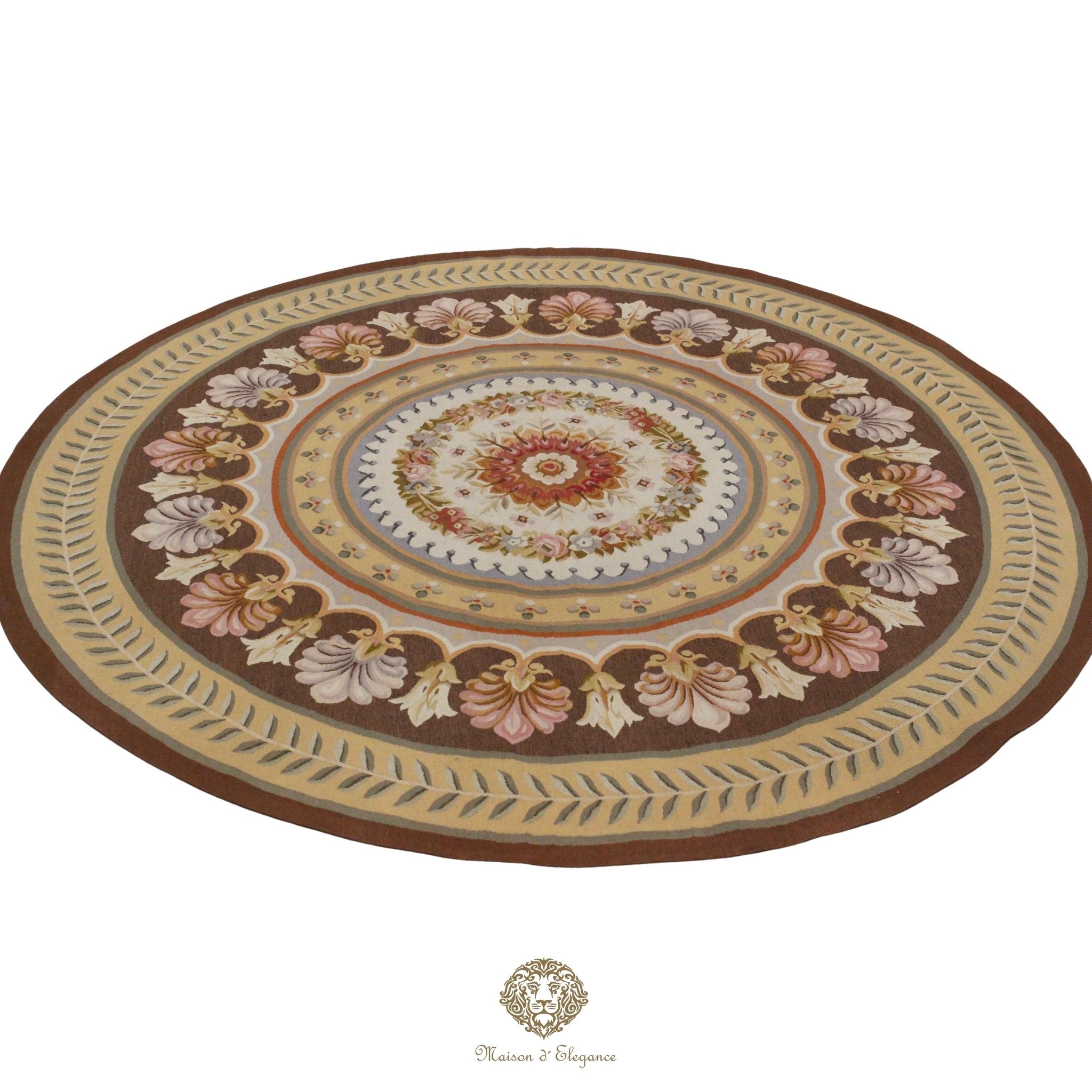 Round decorative French Aubusson with floral patterns on a brown background