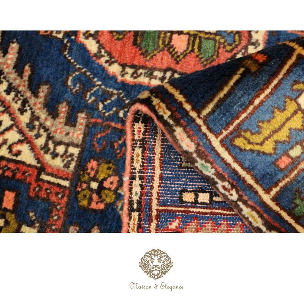 Close-up of a colorful patterned rug with intricate designs.