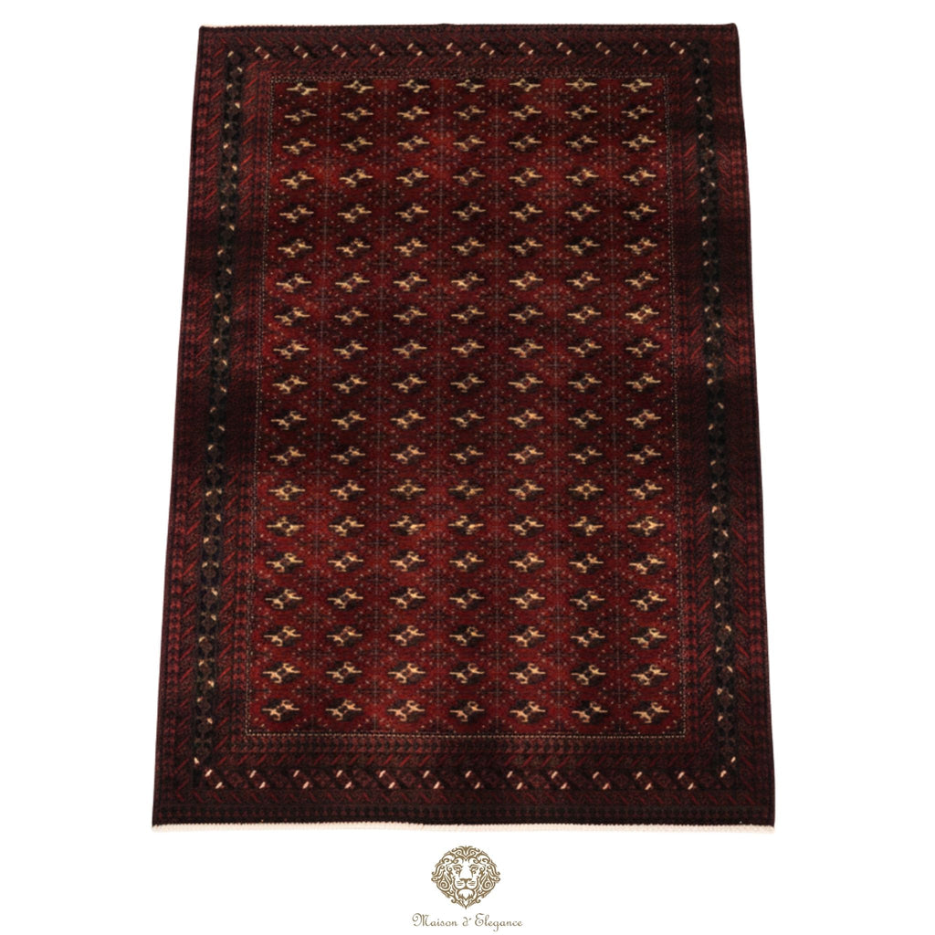 Decorative rug with intricate pattern on a rojo background