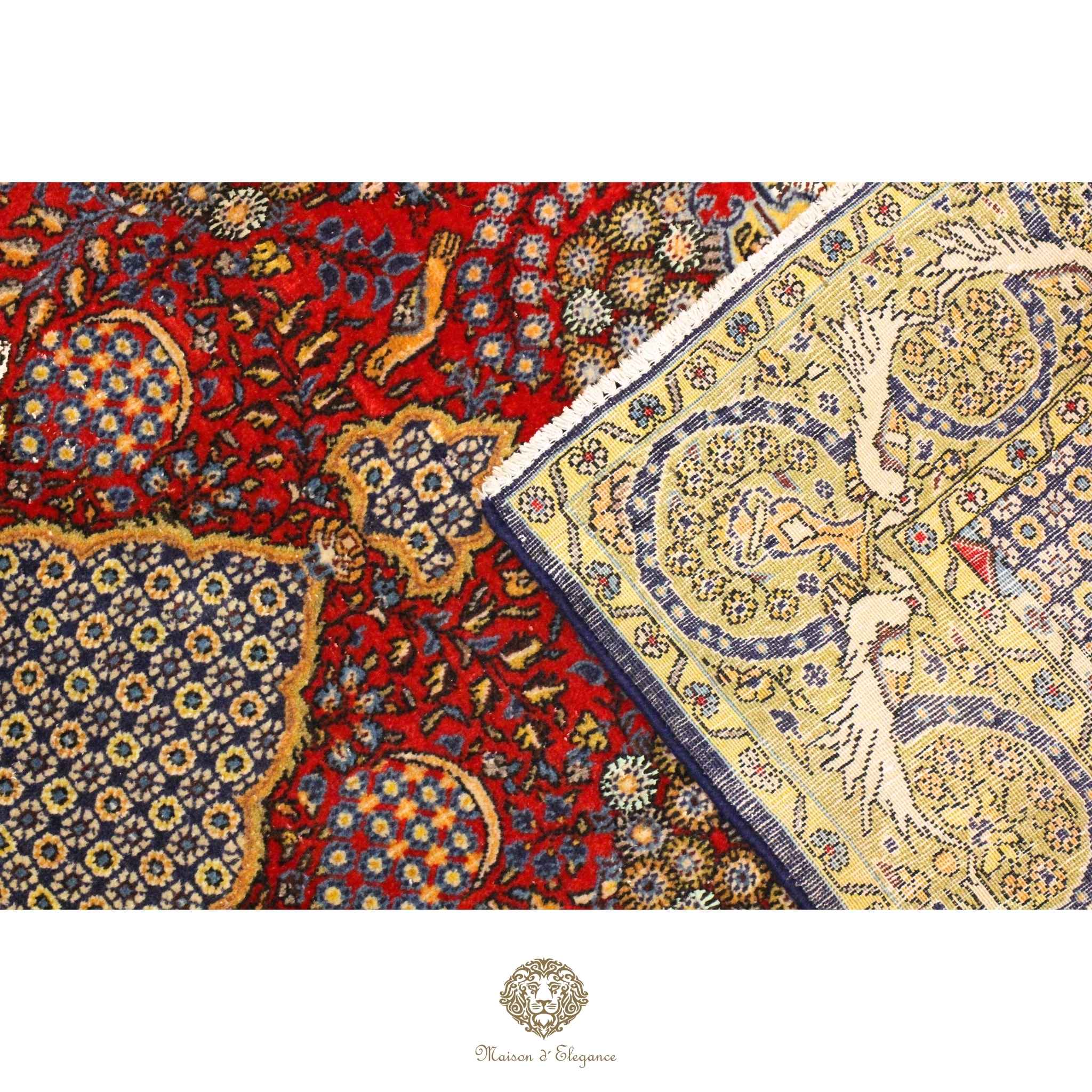 Close-up of patterned rugs with intricate designs on a red background