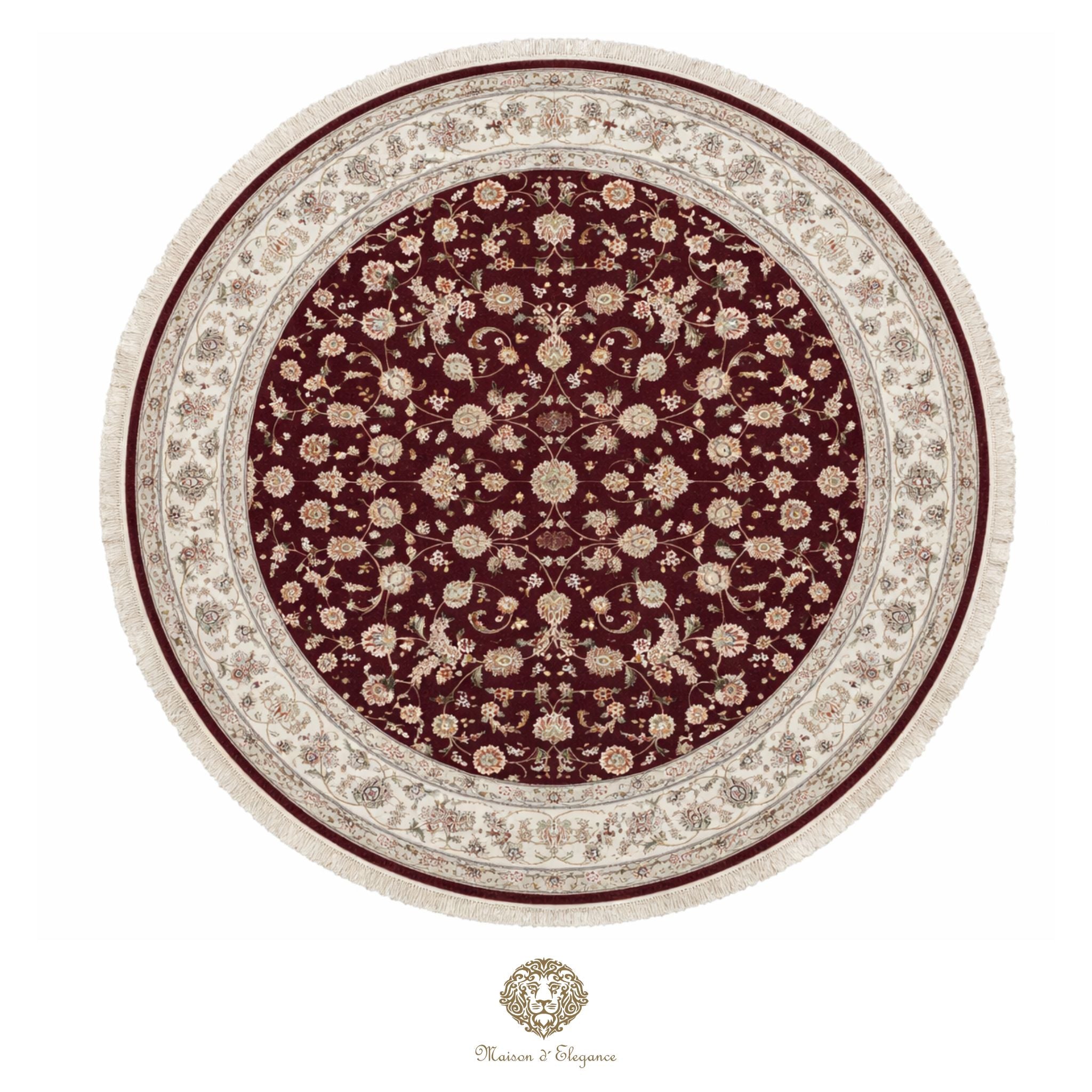 Round floral-patterned rug with a maroon center and beige border on a white background