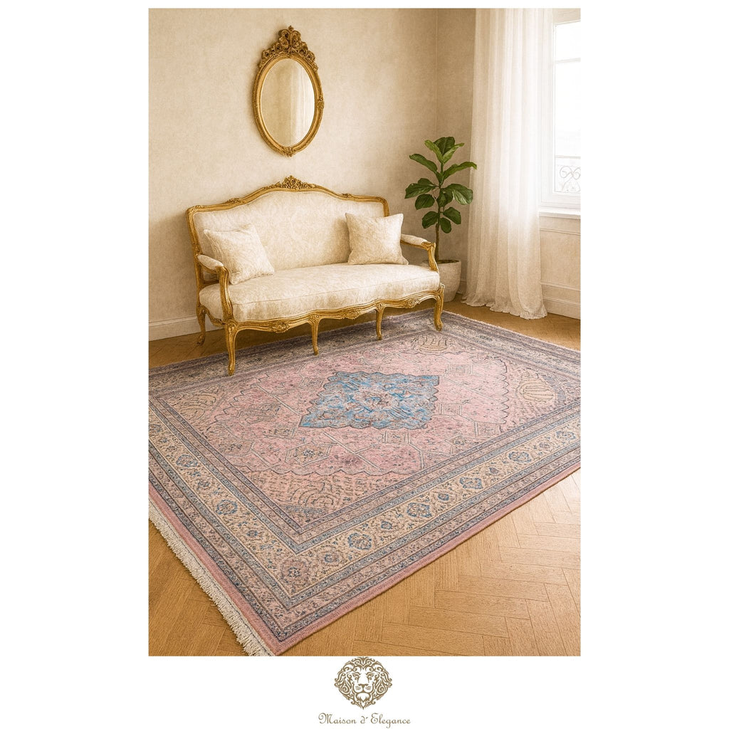 Decorative rug with intricate patterns in a room with a sofa and mirror.
