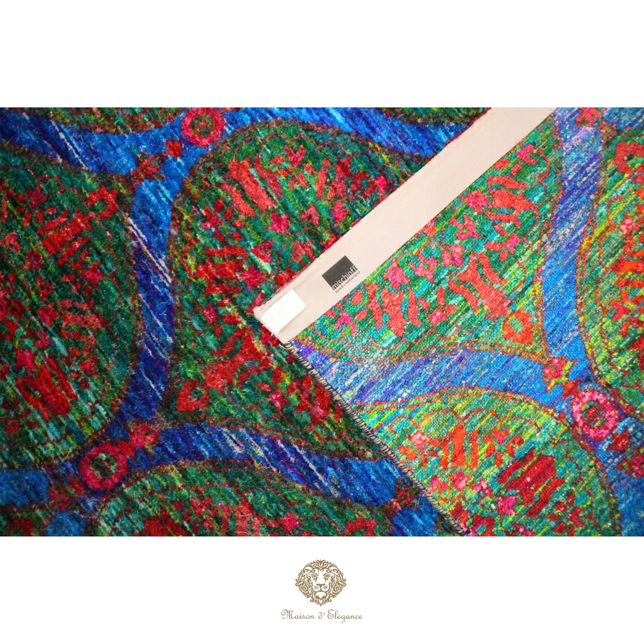 Colorful patterned fabric with a measuring tape, branded 'Chitrakoot & Co.'
