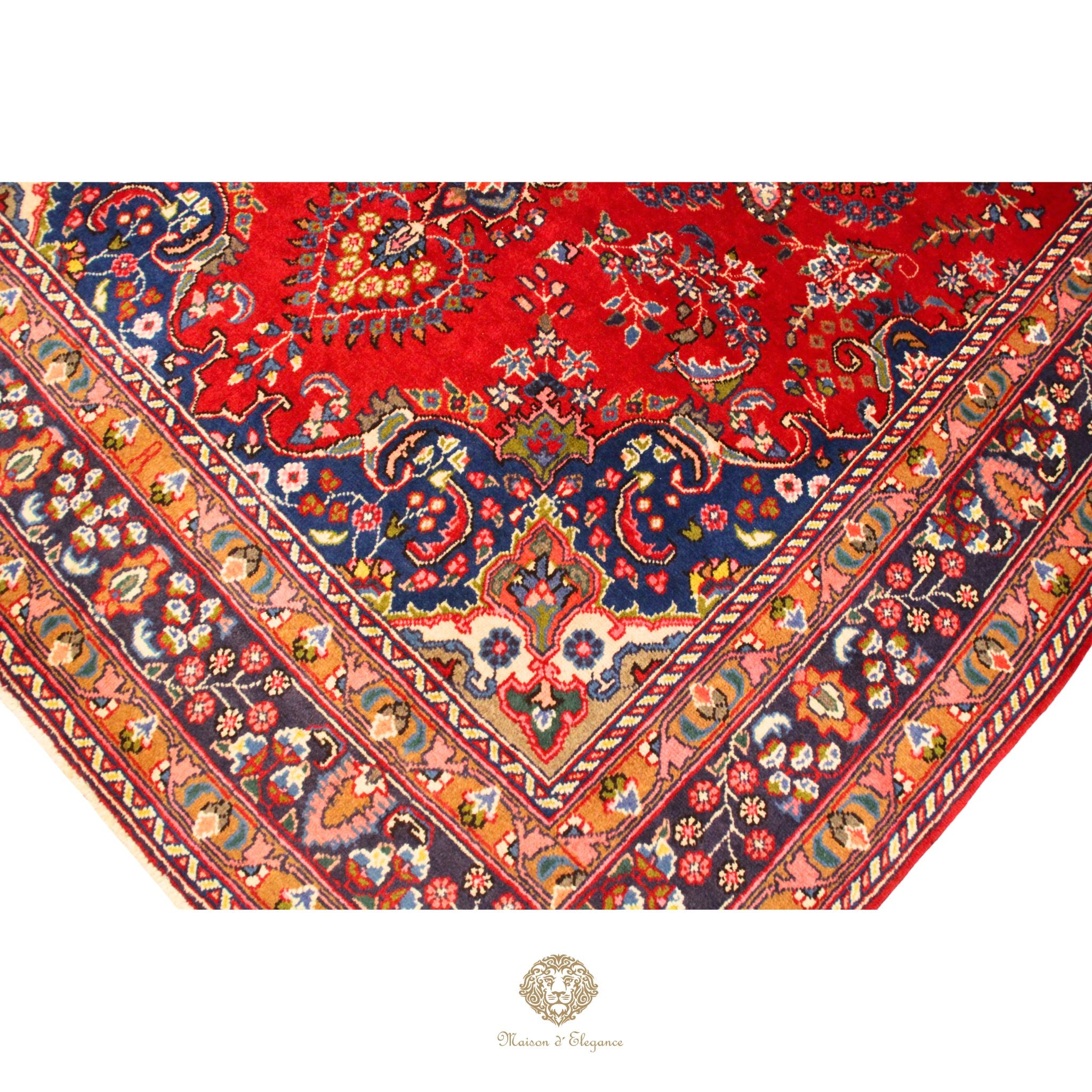 Decorative rug with intricate patterns on a red background