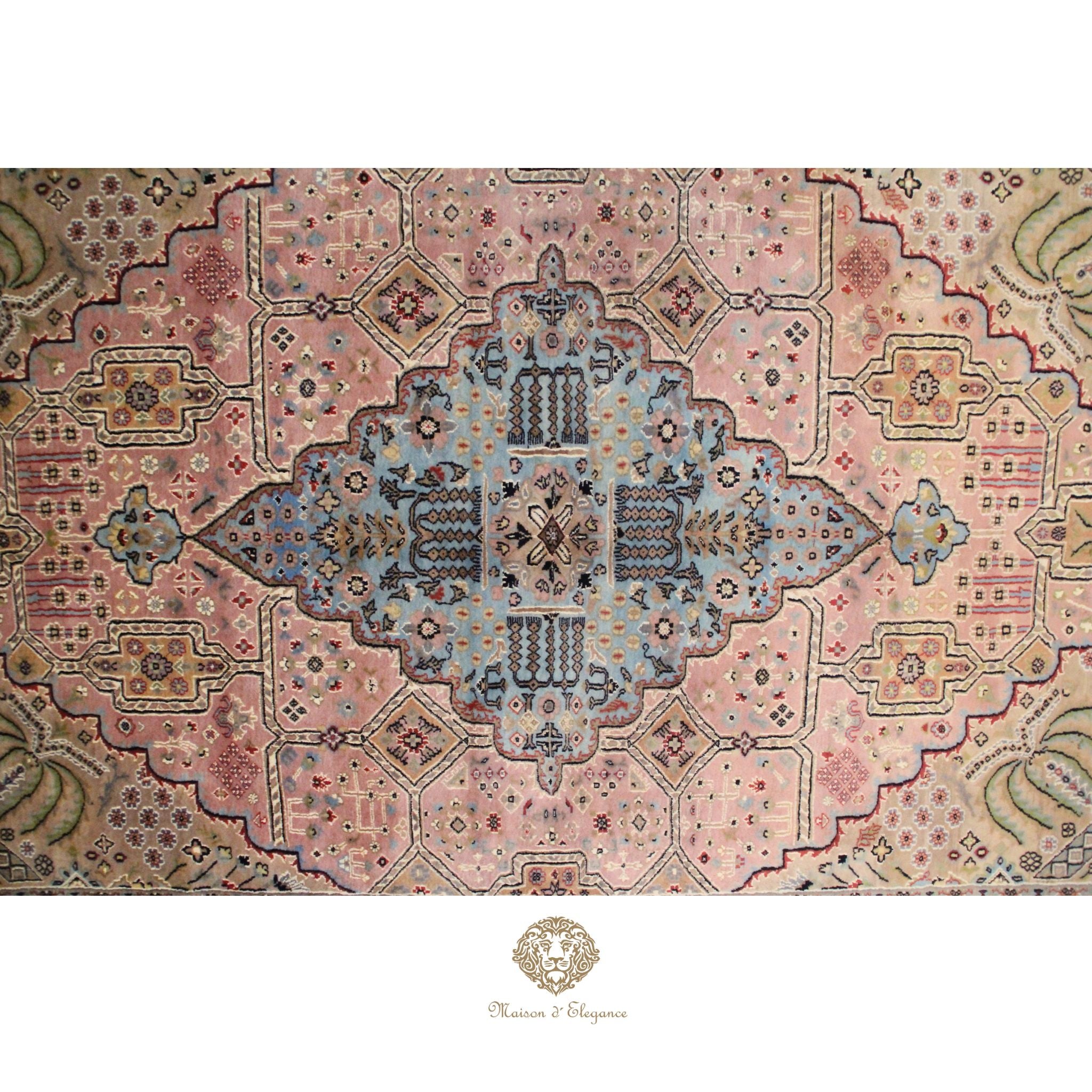 Decorative rug with intricate patterns and colors on a rosa background