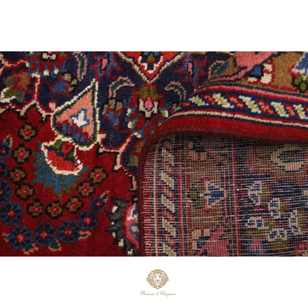 Close-up of a colorful patterned rug with intricate designs.