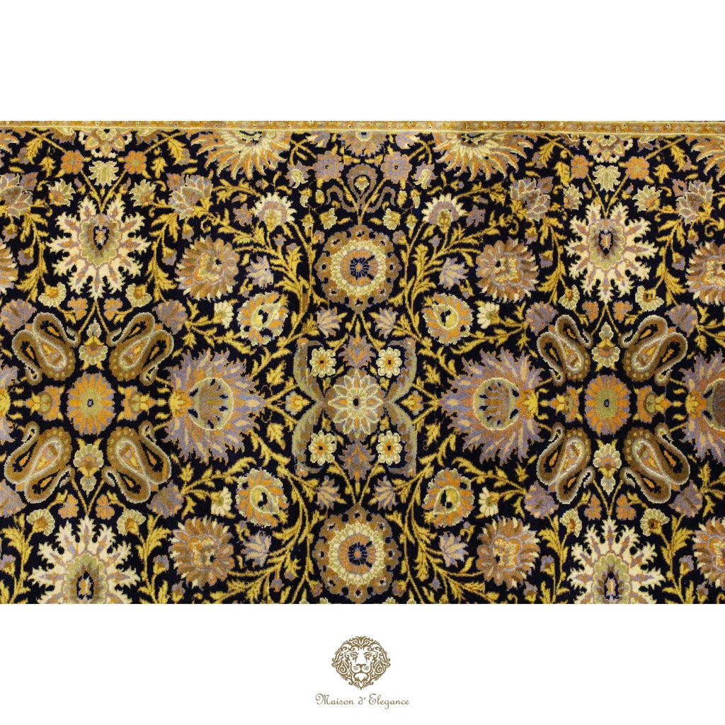 Decorative fabric with intricate paisley and floral pattern on a navy background