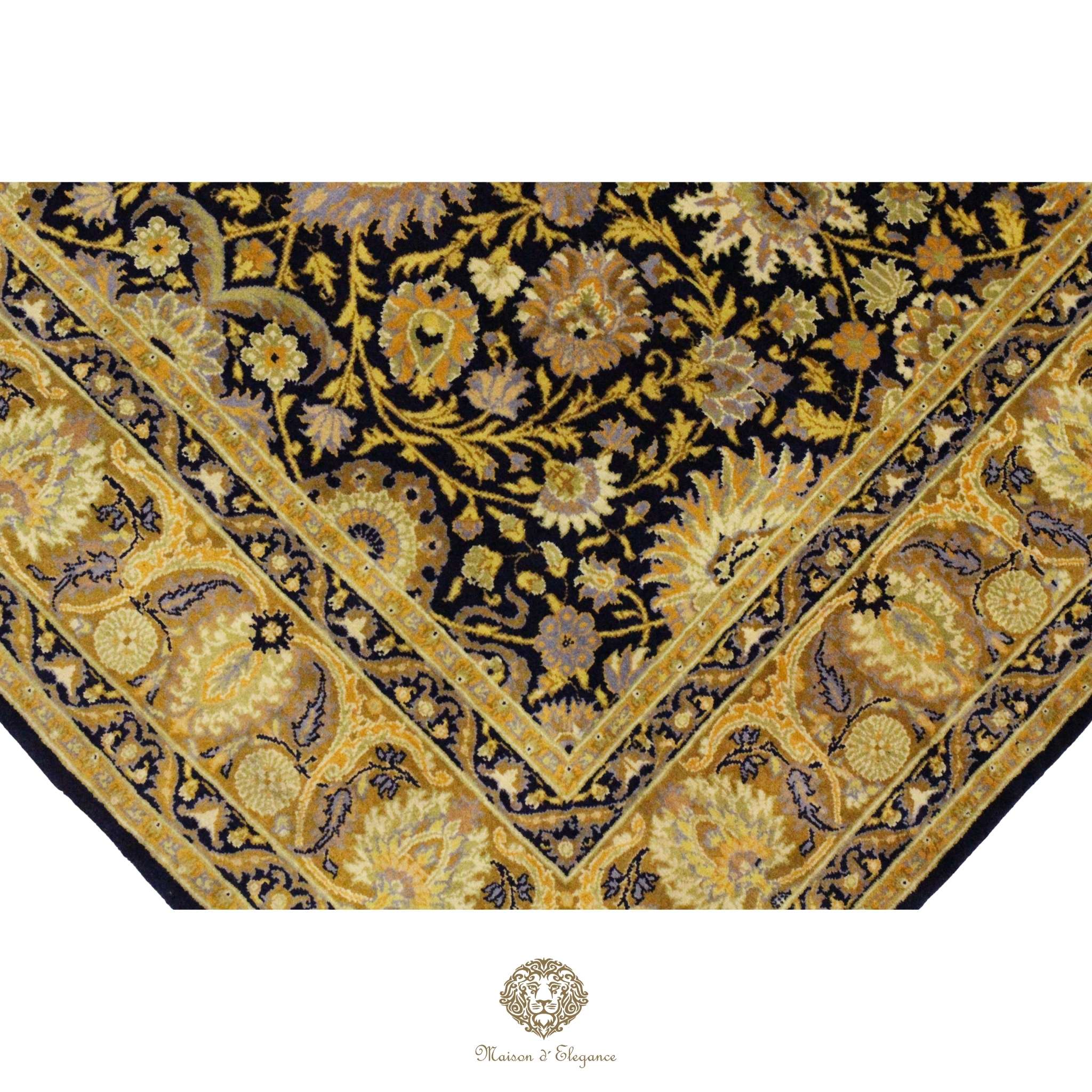 Decorative rug with floral and leaf patterns on a navy background