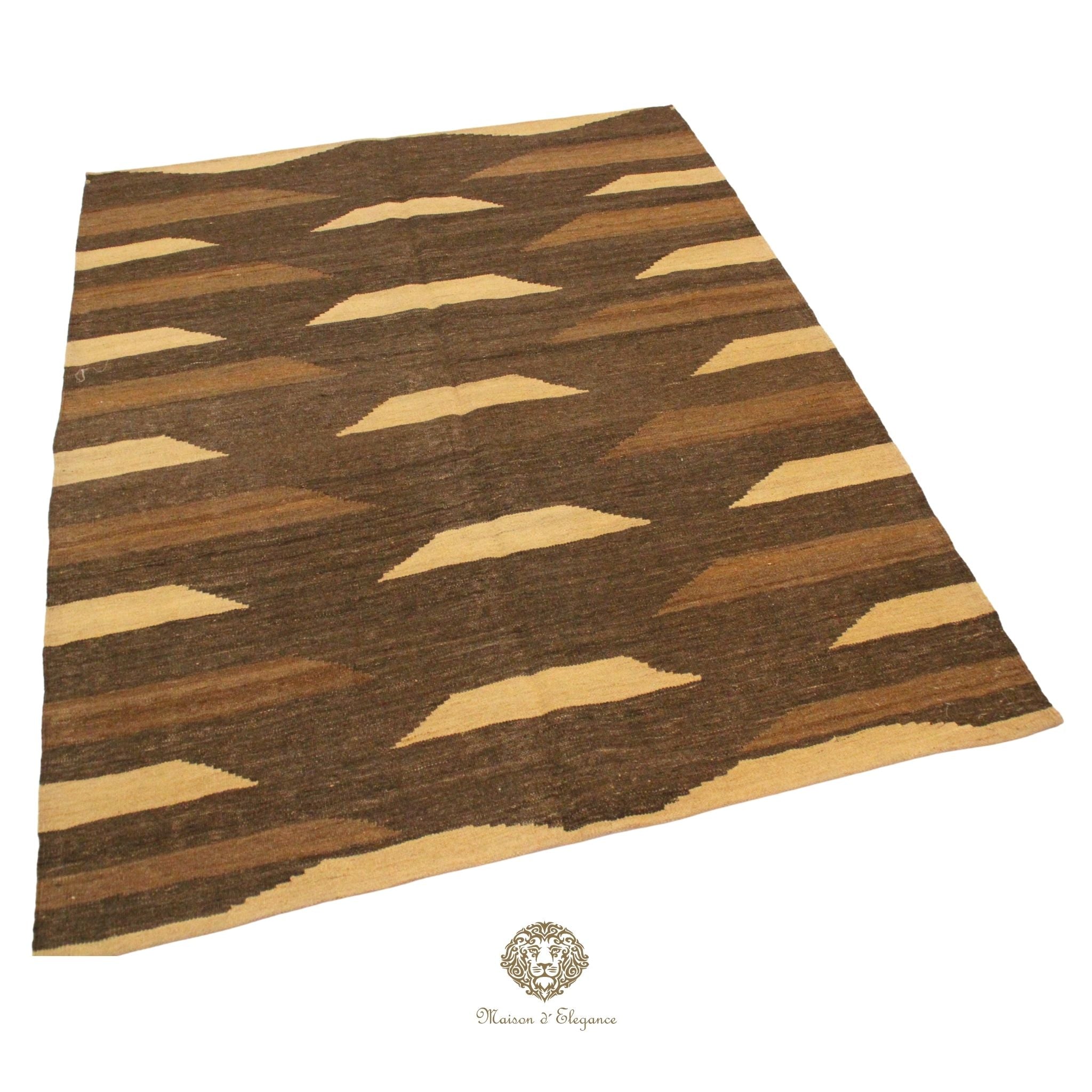 Woven rug with brown and beige pattern on a brown background