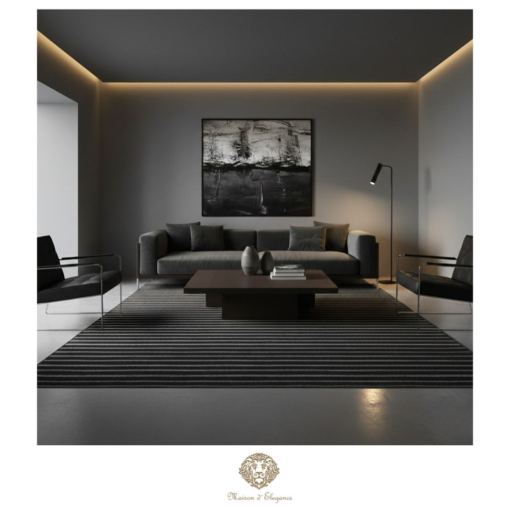 Modern living room with dark gray sofa, coffee table, and wall art.
