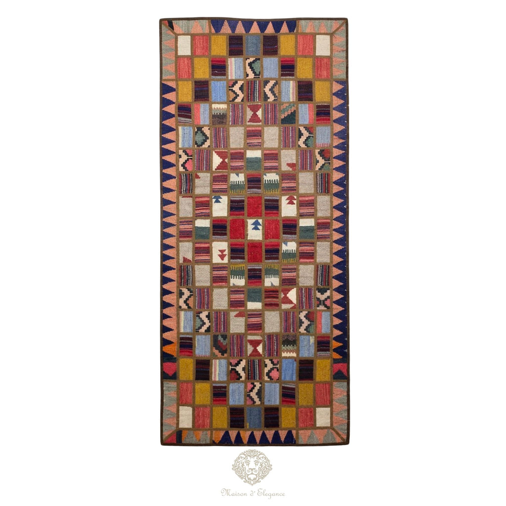 Multicolored patterned rug on a white background