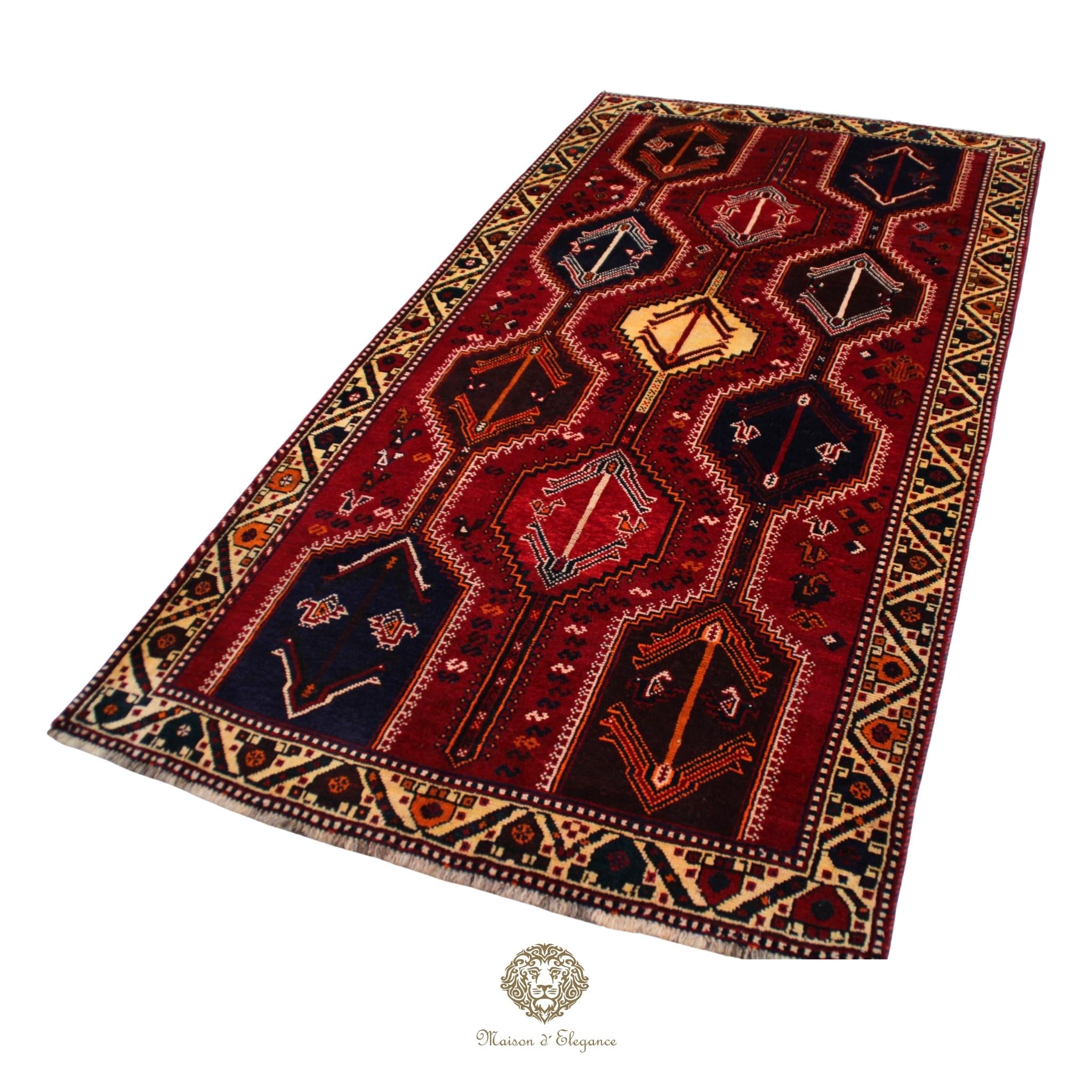 Decorative rug with geometric pattern on a red background